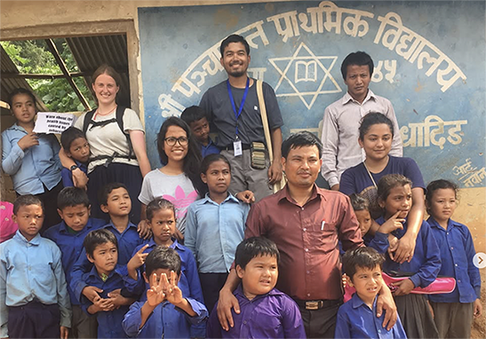 My volunteer colleagues Emma McEvoy, Romisha Thapa, and me in Dhading, Nepal (2018)